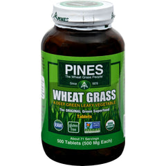 Pines Organic Wheat Grass Tablets close-up showing vibrant greens for a daily greens boost.