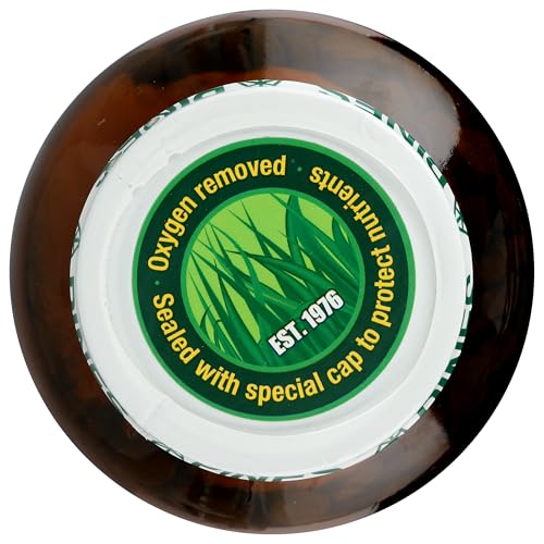 Pines Wheat Grass Tablets served with juice to reinforce greens on the go.