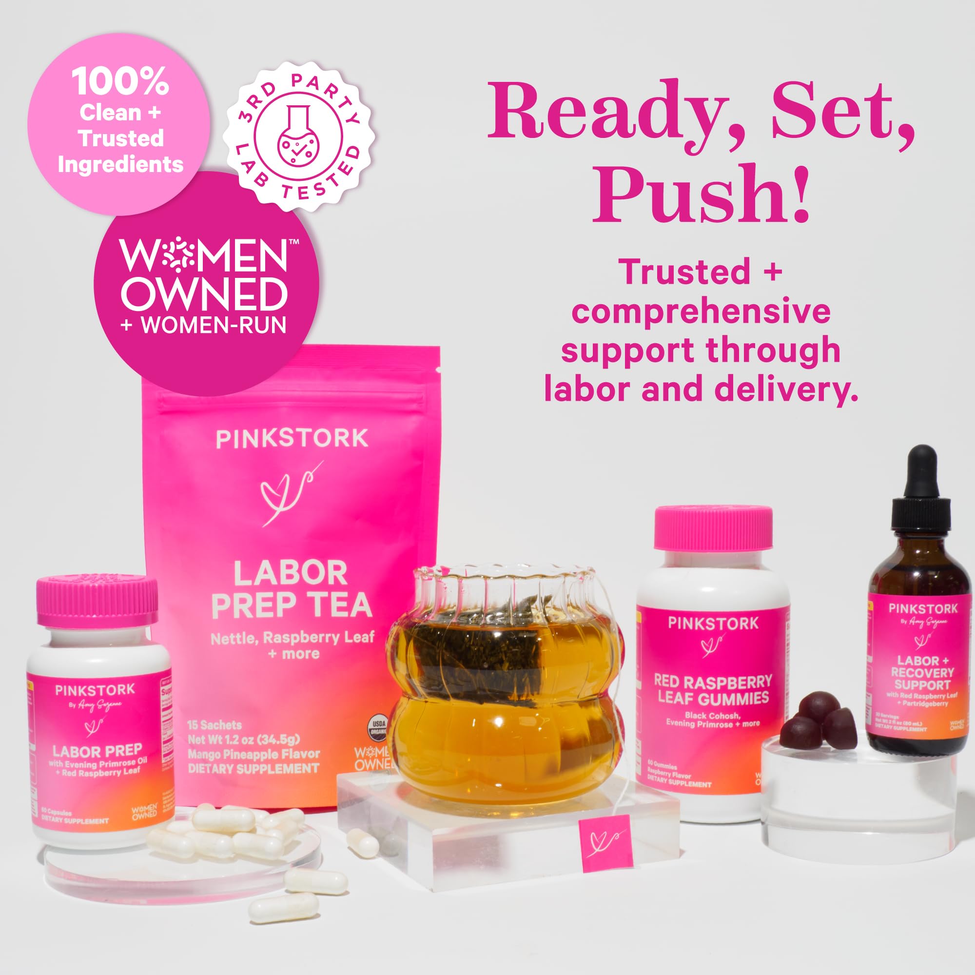 Pink Stork Labor Prep bottle in hand suggests easy daily use.