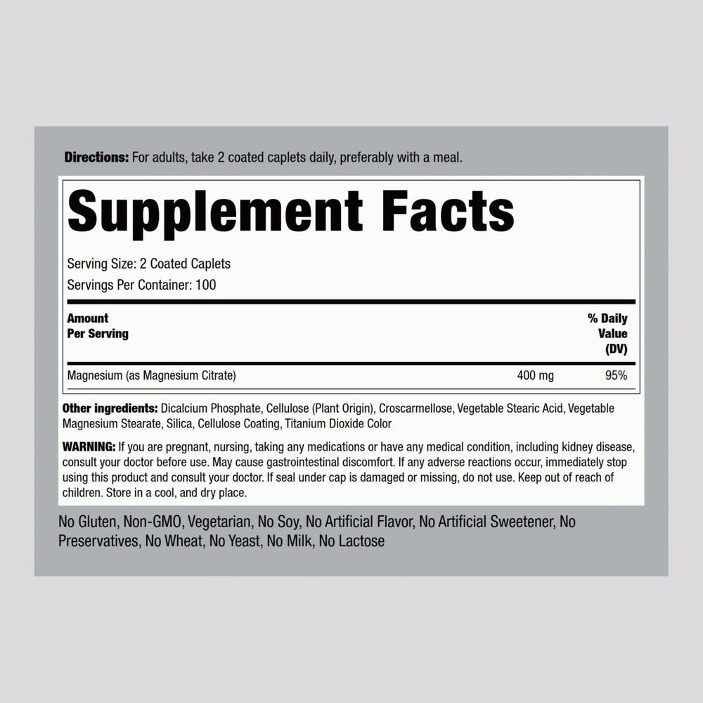 Piping Rock Magnesium Citrate caplets close-up shows smooth coating for easy swallowing.