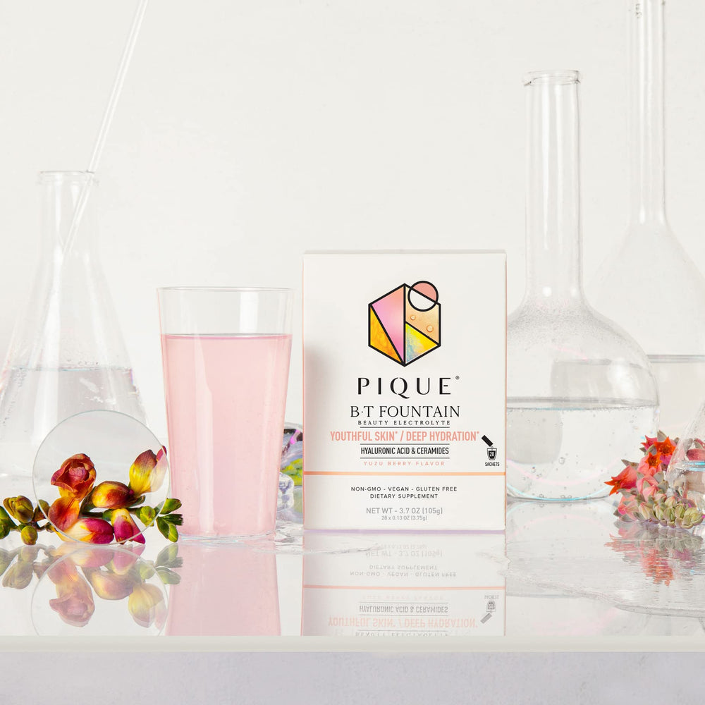 PIQUE BT Fountain glass with clear water after adding powder.