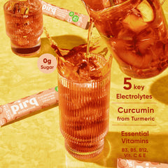 Pirq Hydration Peach Tea being poured into a glass.