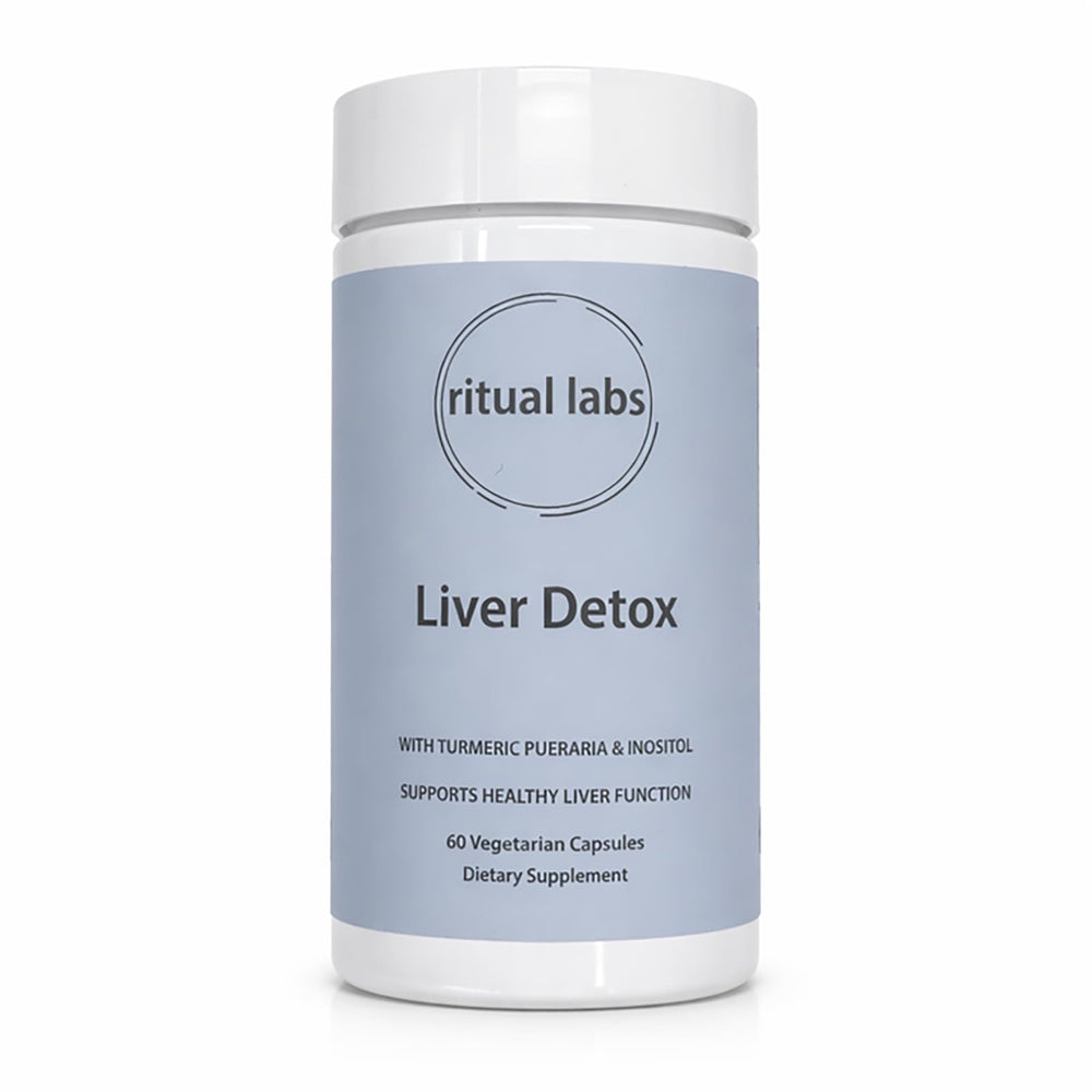 Piuregn Ritual Labs bottle on kitchen counter for daily liver wellness.