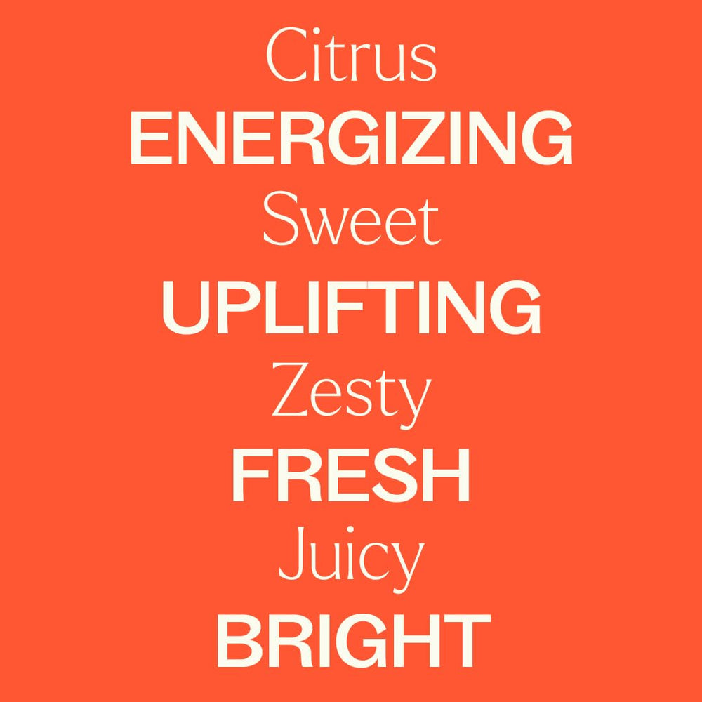 Plant Therapy Blood Orange bottle with massage setup, suggesting a mood-boosting aromatherapy ritual.