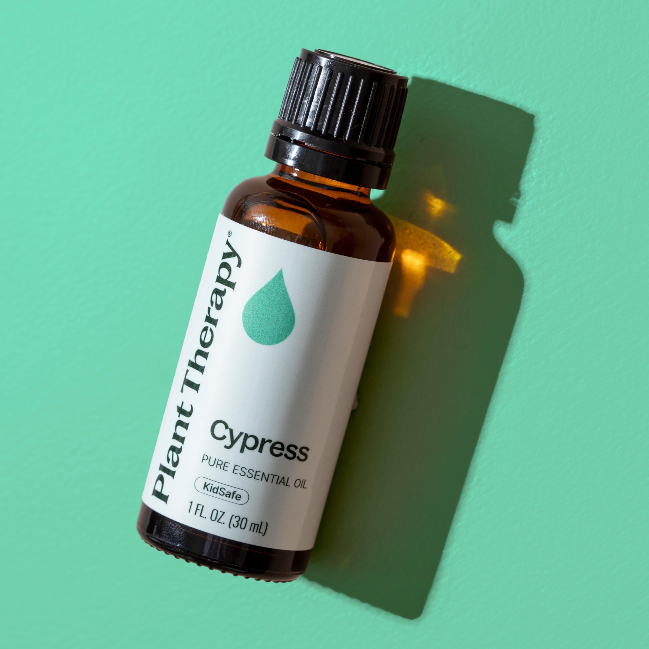 Dropper dispensing Cypress Essential Oil for safe blending