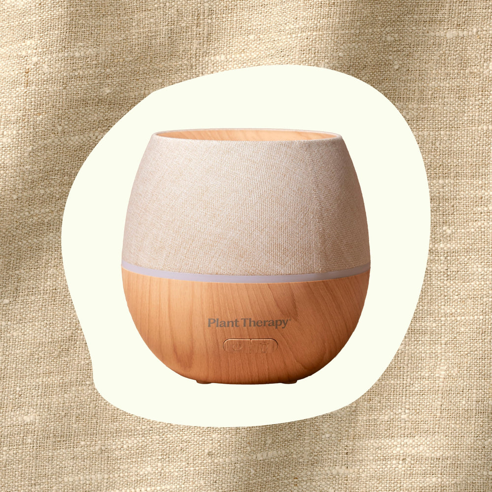 Plant Therapy Drift Linen Diffuser mist mode control close-up for customizable sessions.