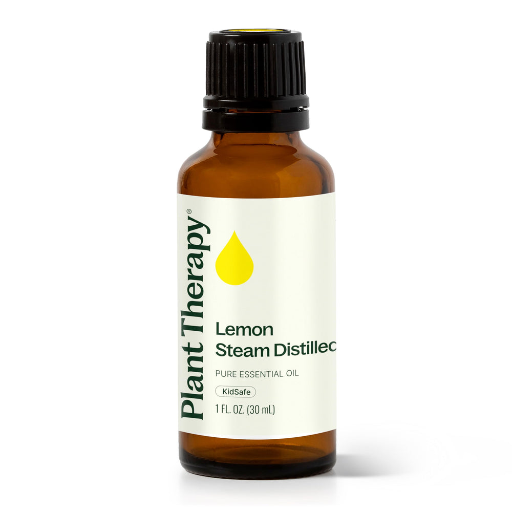 Plant Therapy lemon oil bottle with pour enhances air freshness and spaces.