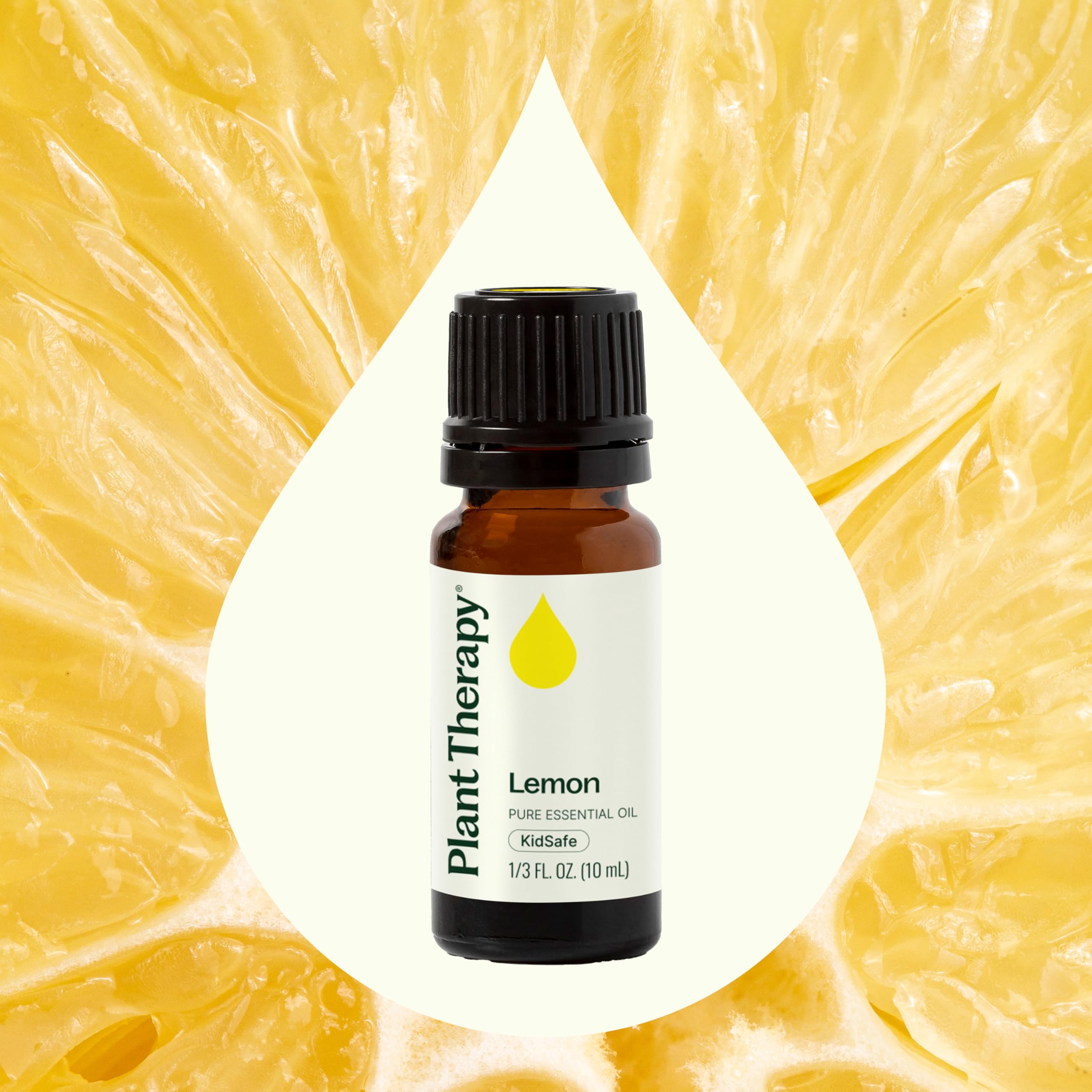 Close-up of Plant Therapy Lemon Oil label with batch information.