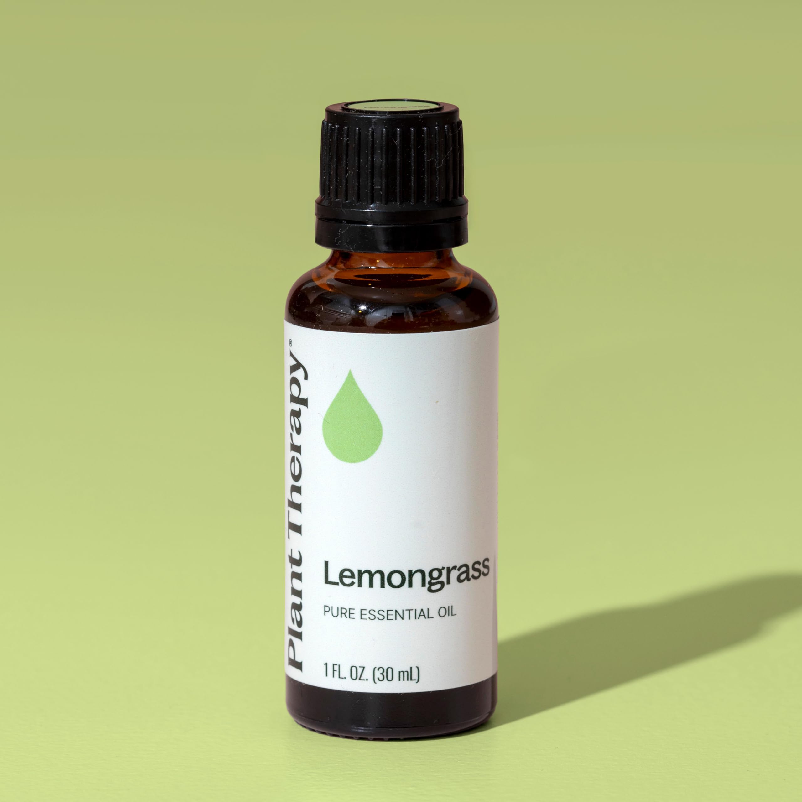 Plant Therapy lemongrass oil in a wooden diffuser demonstrates scent diffusion and ambient freshness.