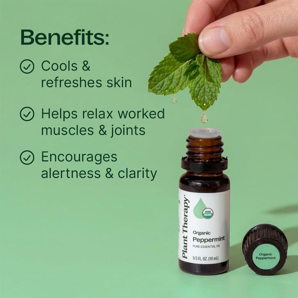 Plant Therapy peppermint oil with carrier oil for neck tension relief in use.