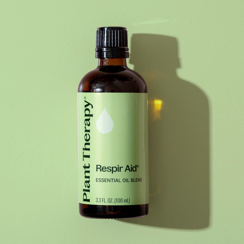 Respir Aid packaging highlights 100% pure essential oil blend.