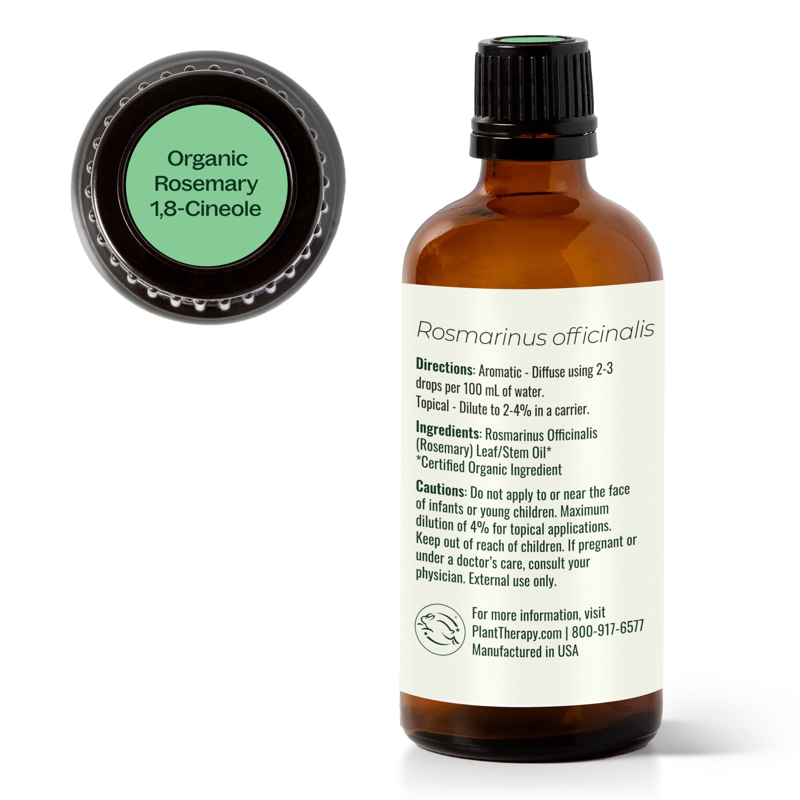 Plant Therapy rosemary oil in a glass bottle beside a diffuser.