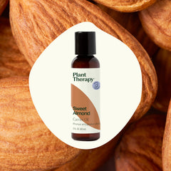 Hair application of Plant Therapy Sweet Almond Oil to tame frizz and boost shine