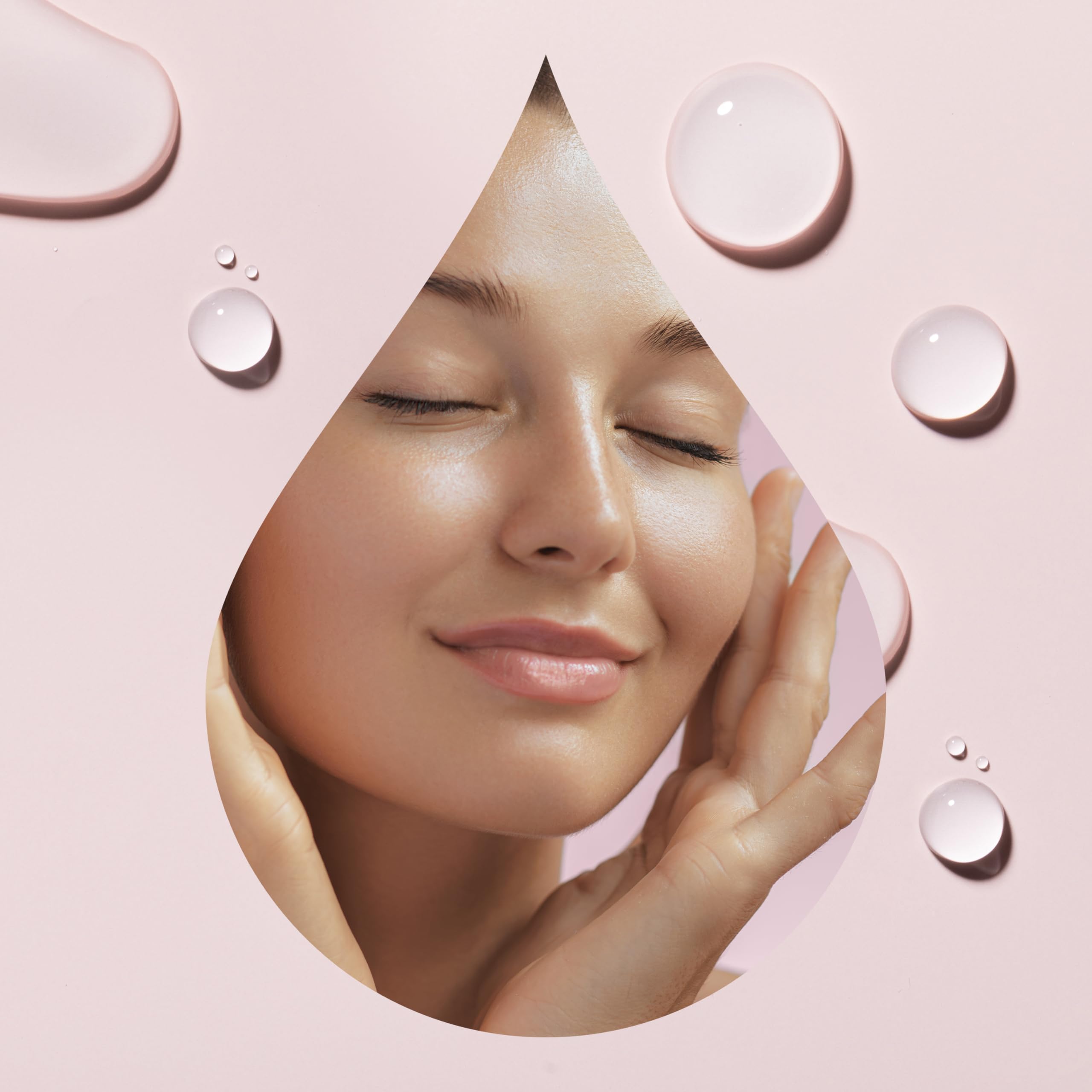 Droppers dispensing Plant Therapy Younger Glo into palm for easy facial application.