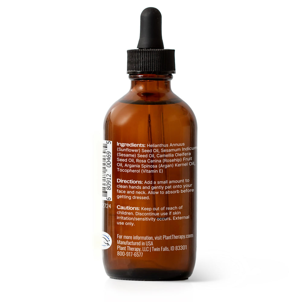 Plant Therapy Younger Glo being massaged onto skin with gentle upward motions.