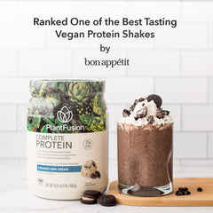 Creamy PlantFusion shake in a glass with smooth texture.