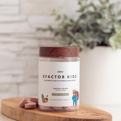 Closeup of Plexus Xfactor Kids chewables highlighting kid-friendly texture and taste.