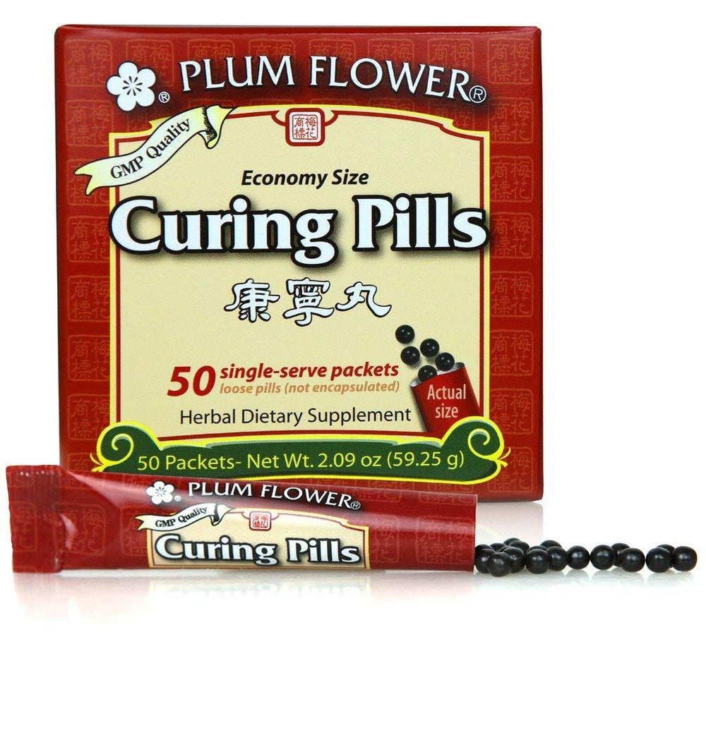 Plum Flower Kang Ning Wan curing pills in stick-pak packaging for easy daily use.