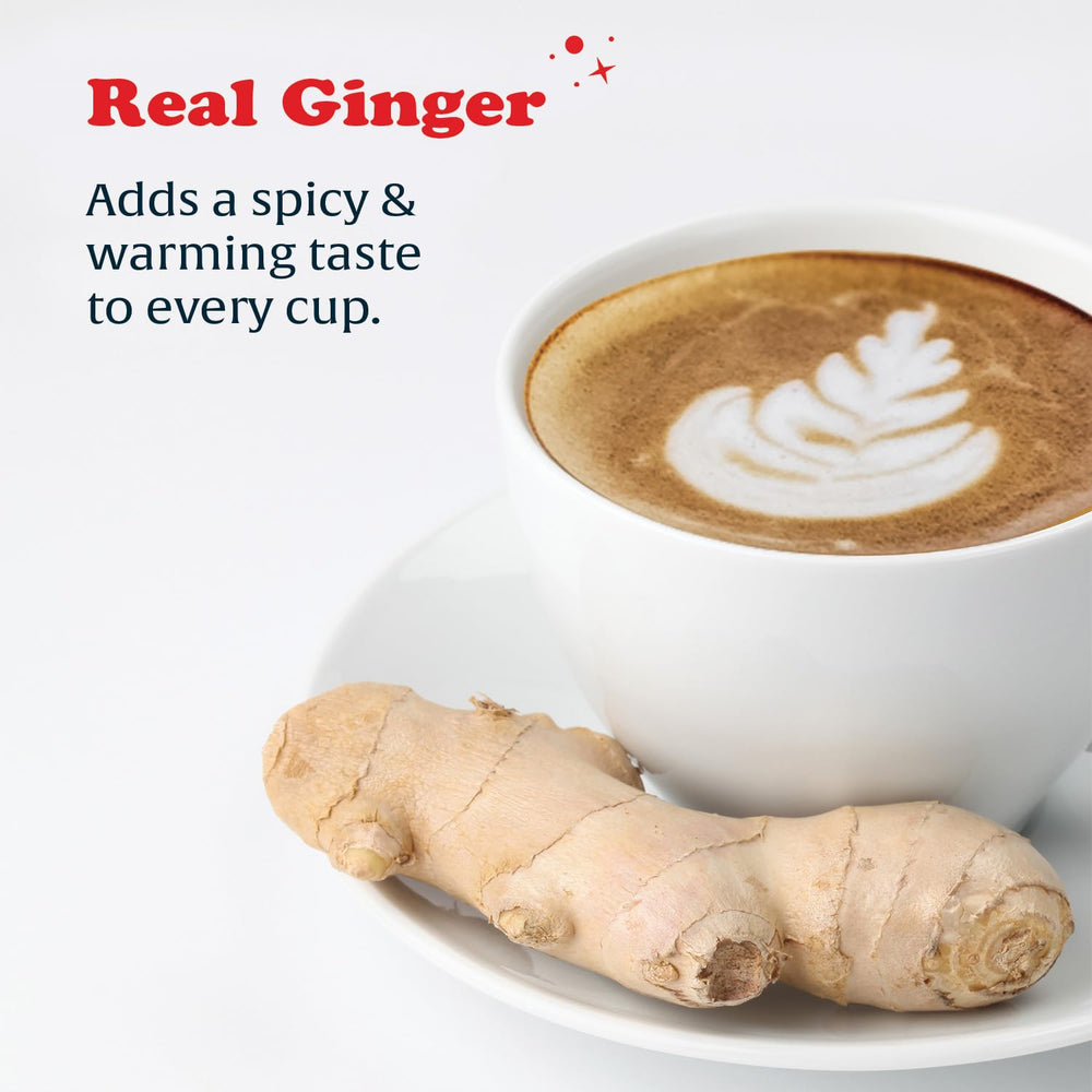 Close-up of ginger extract enhancing the latte's warmth.
