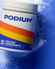 Podium Creatine Monohydrate tub displays high-purity powder