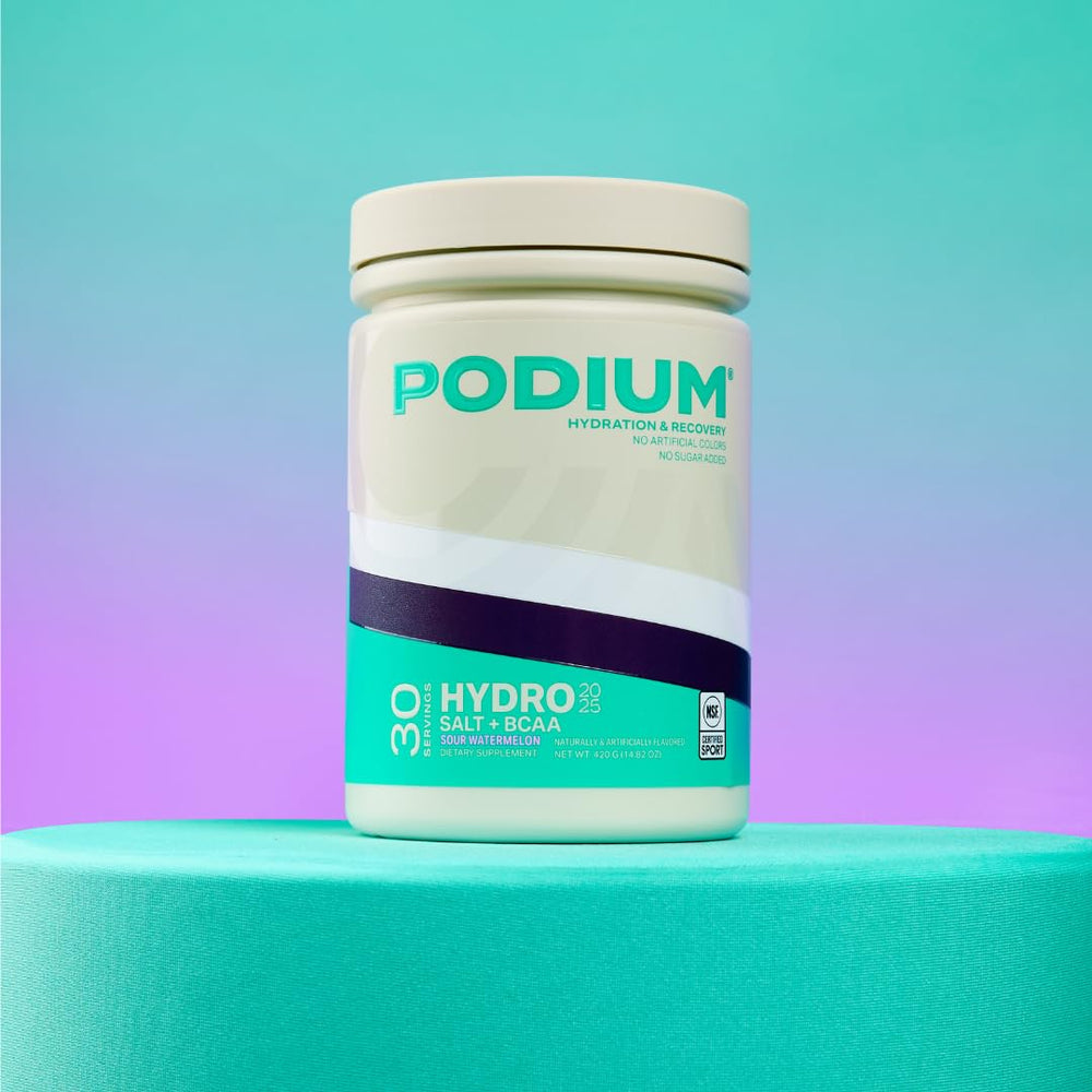 Podium Hydro Salt Sour Watermelon drink in a glass after training for refreshing hydration.