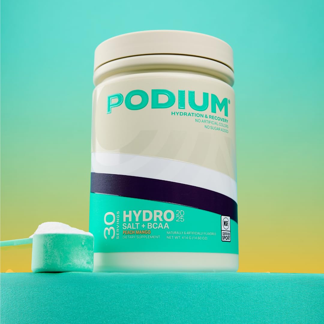 Podium Nutrition Hydro Salt peach mango mixed glass showcasing refreshing hydration.