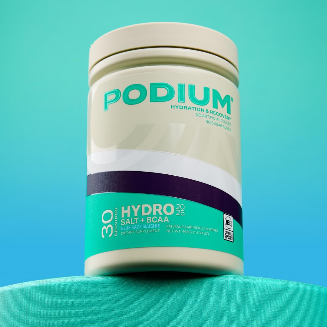Pouring Hydro Salt powder into water for a refreshing drink.