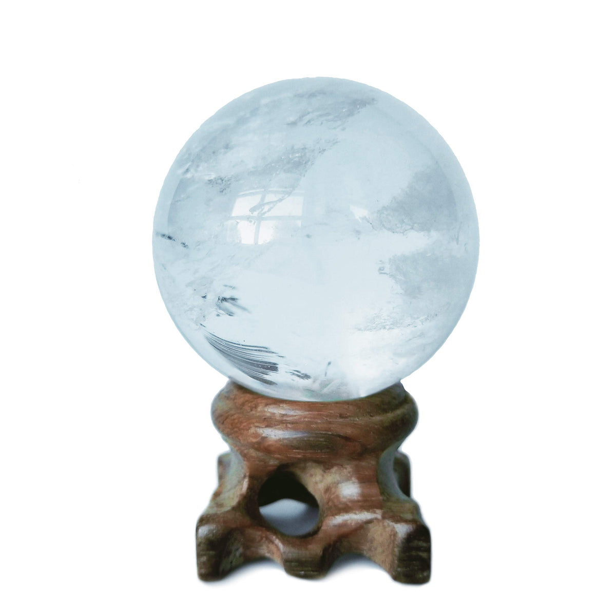 Polar Jade clear quartz ball 45mm for meditation and energy focus.