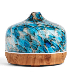 Porseme 500ml diffuser with star-pattern glass cover enhances bedroom ambience.