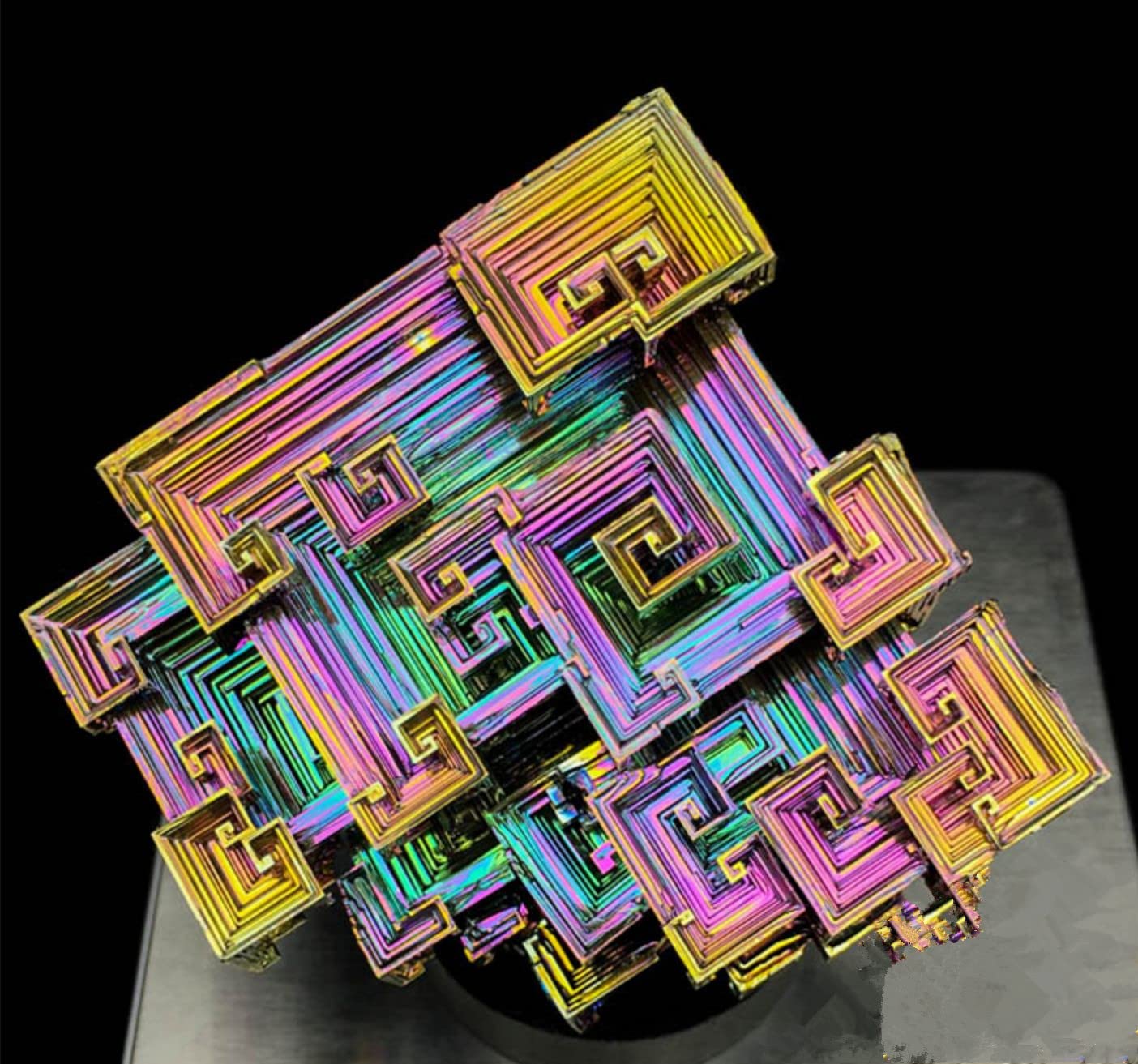 Pounique bismuth crystal rainbow surface enhances ambience and focus.