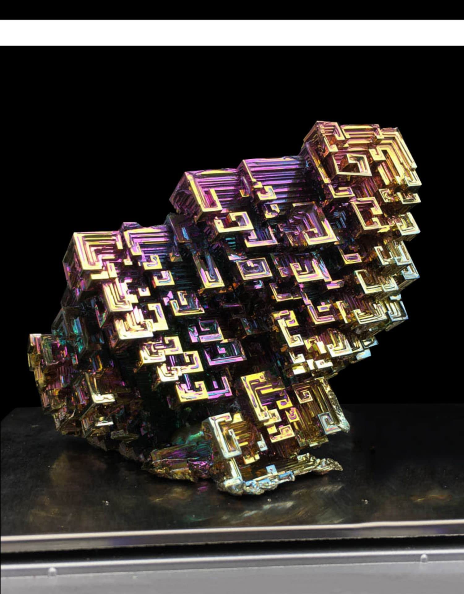 Pounique Bismuth Crystal stair-step pattern showcases lab-grown iridescence for decor and study.