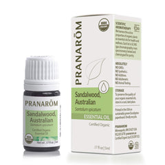 Pranarom sandalwood essential oil bottle with amber glass, ideal for diffusion and skincare routines.