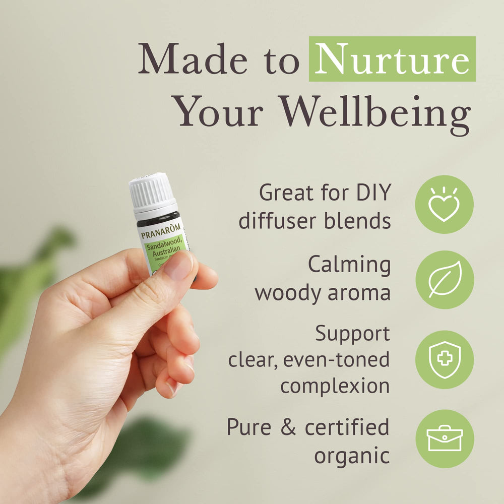 Pranarom sandalwood oil label closeup communicates organic certification and purity.