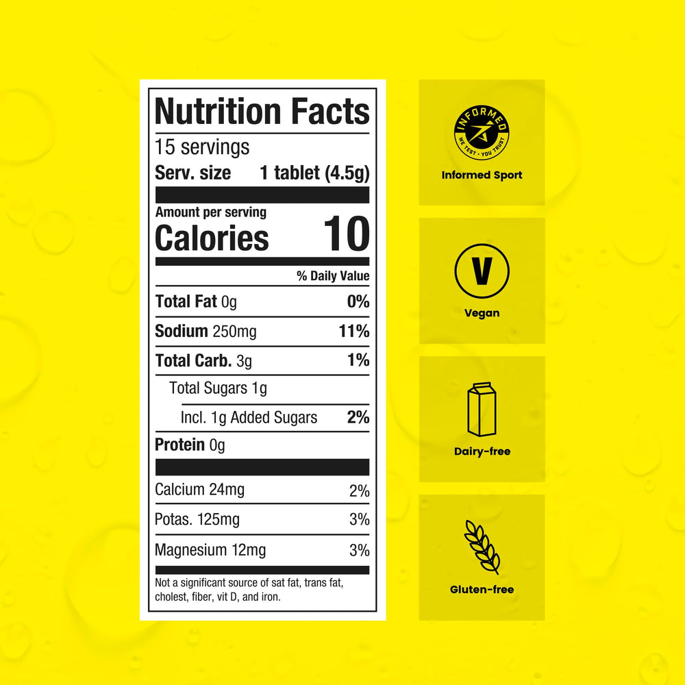 Open yellow tube of Precision Hydration tablets ready for on-the-go hydration.