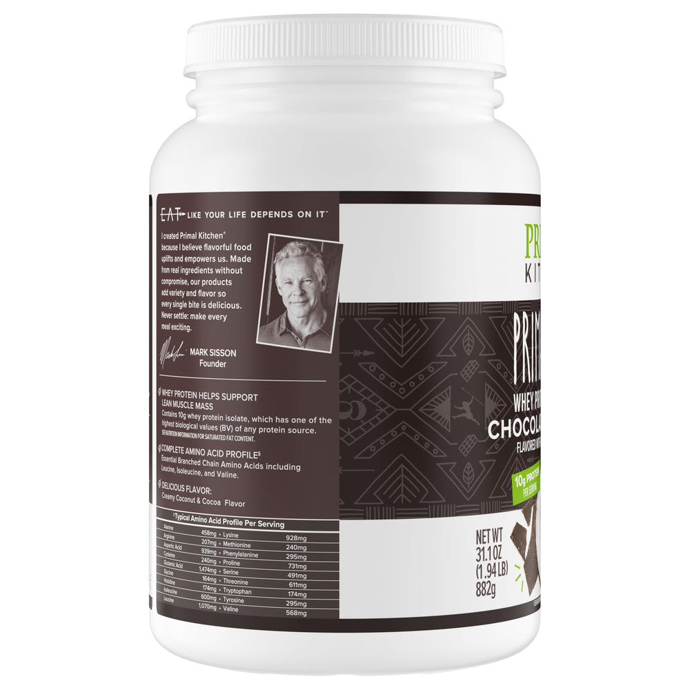 Glass of ready-to-drink Primal Fuel chocolate coconut shake.