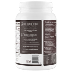 Primal Fuel chocolate coconut shake being poured, smooth texture.