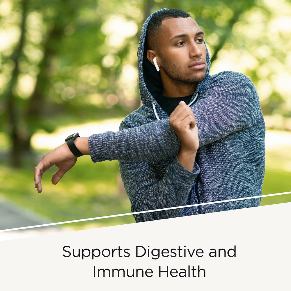 Pro-Biome daily serving with spoon shows probiotic and prebiotic blend