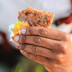 PROBAR Meal Bar nutty texture close-up signals protein and fiber support in a tasty bite