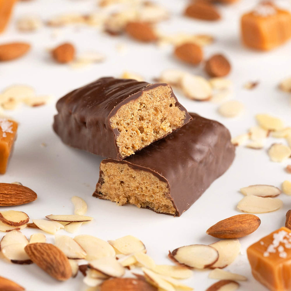 Close-up of ProBAR Sea Salt Caramel bar shows creamy almond butter texture for post-workout energy.