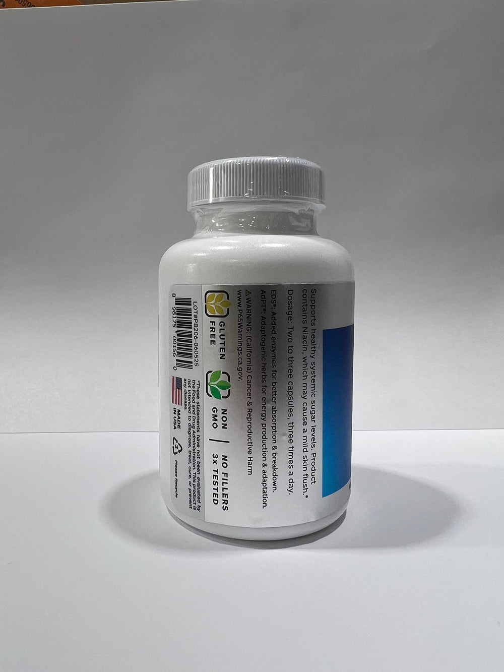 Sugar Metabolizer with a glass of water, convenient daily supplement from Professional Botanicals.