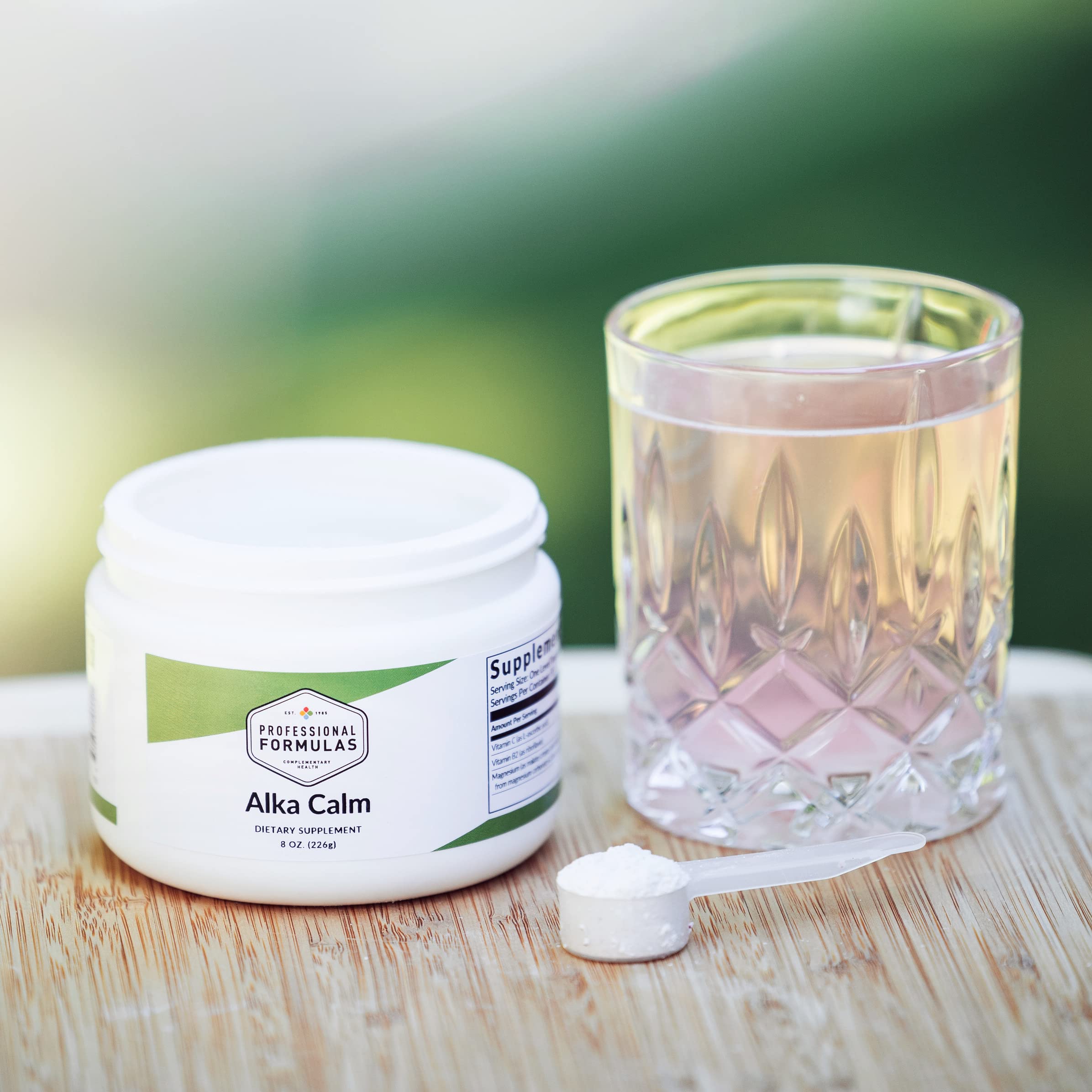 Alka Calm dissolving powder in water for quick electrolyte replenishment.