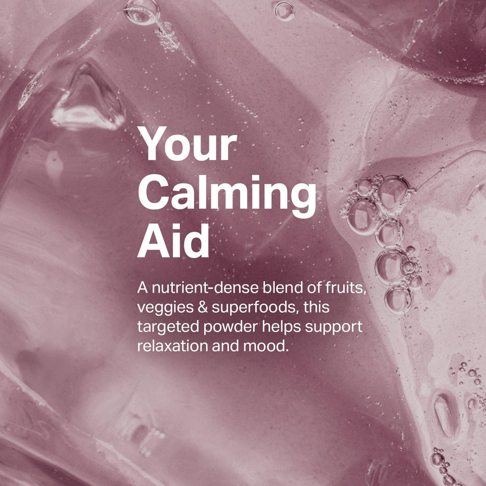 Proper Calming Aid composition shown with glass of water for easy mixing.