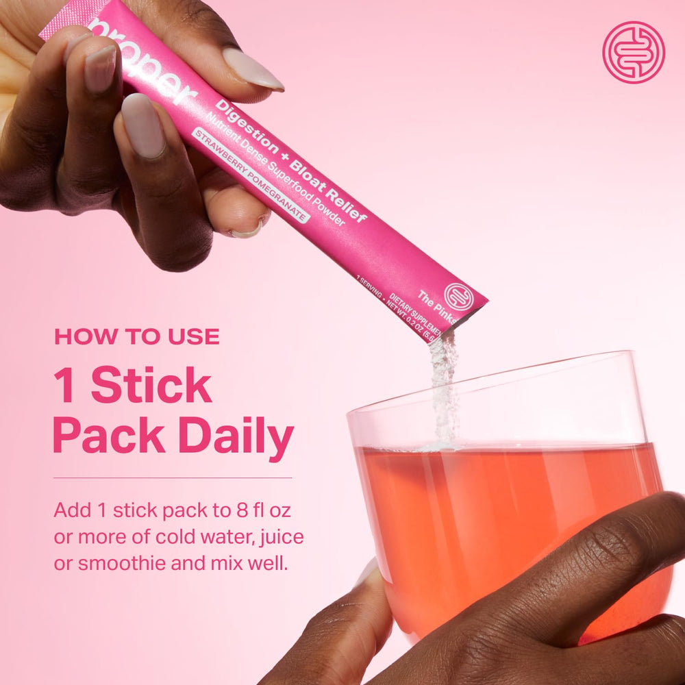 Proper Pinks powder dissolving in liquid, showing texture and mixability.