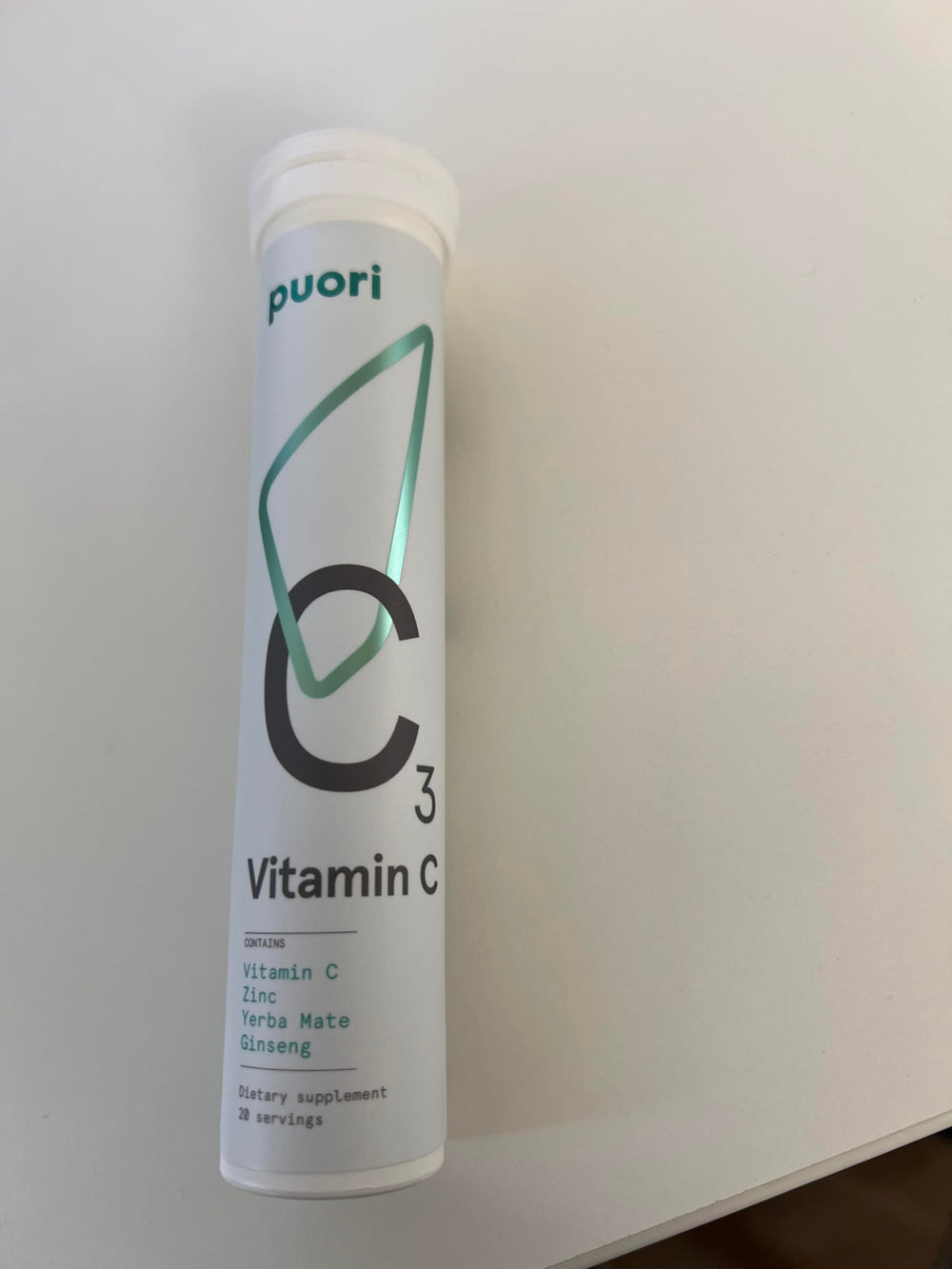 Puori C3 tablet dissolving in water for a clean, sugar-free drink.