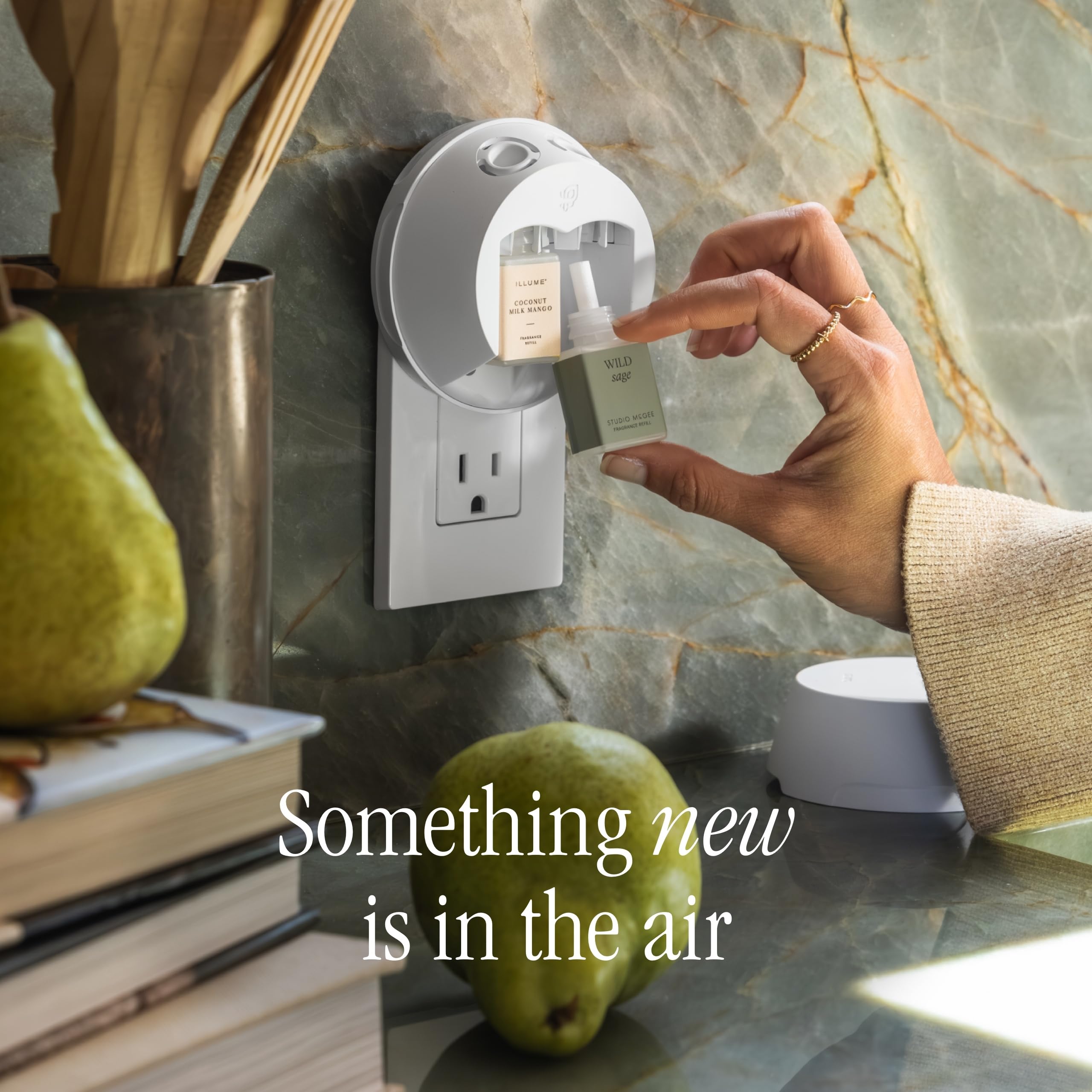 Pura 4 diffuser shown with smartphone app control for scheduling scents.