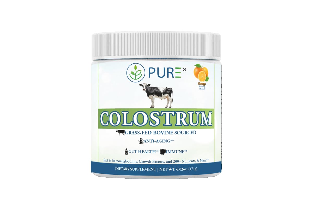 PURE Colostrum Orange powder in a glass jar for daily wellness.