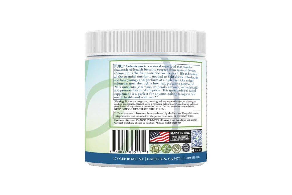 USA-made GMP facility label on PURE Colostrum Orange bottle.