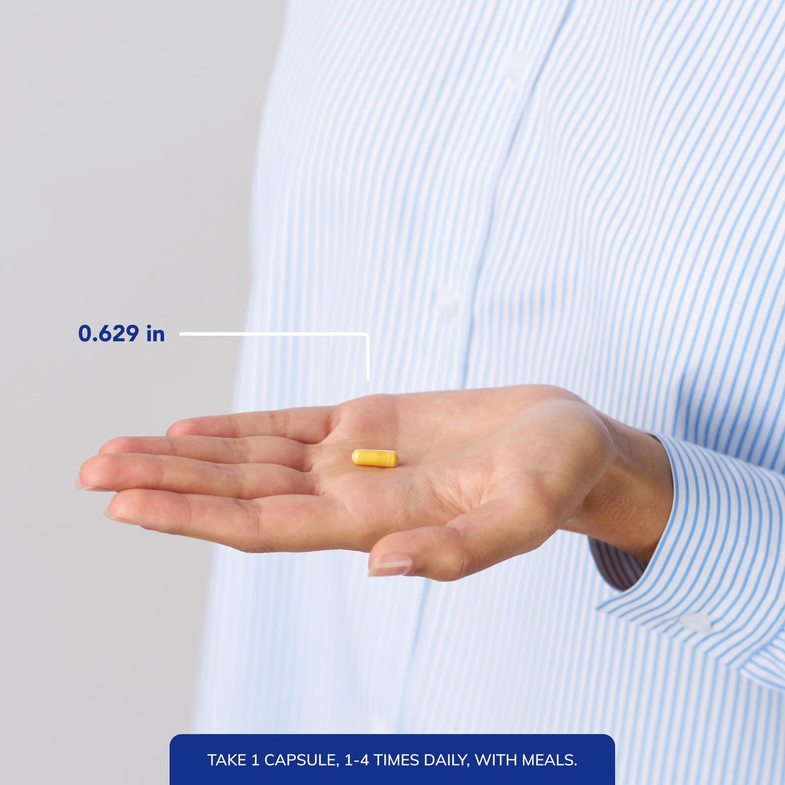 Pure Encapsulations CoQ10 bottle with open capsules for easy dosing.