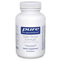 Pure Encapsulations Daily Stress Formula bottle on a desk for calm daily use.
