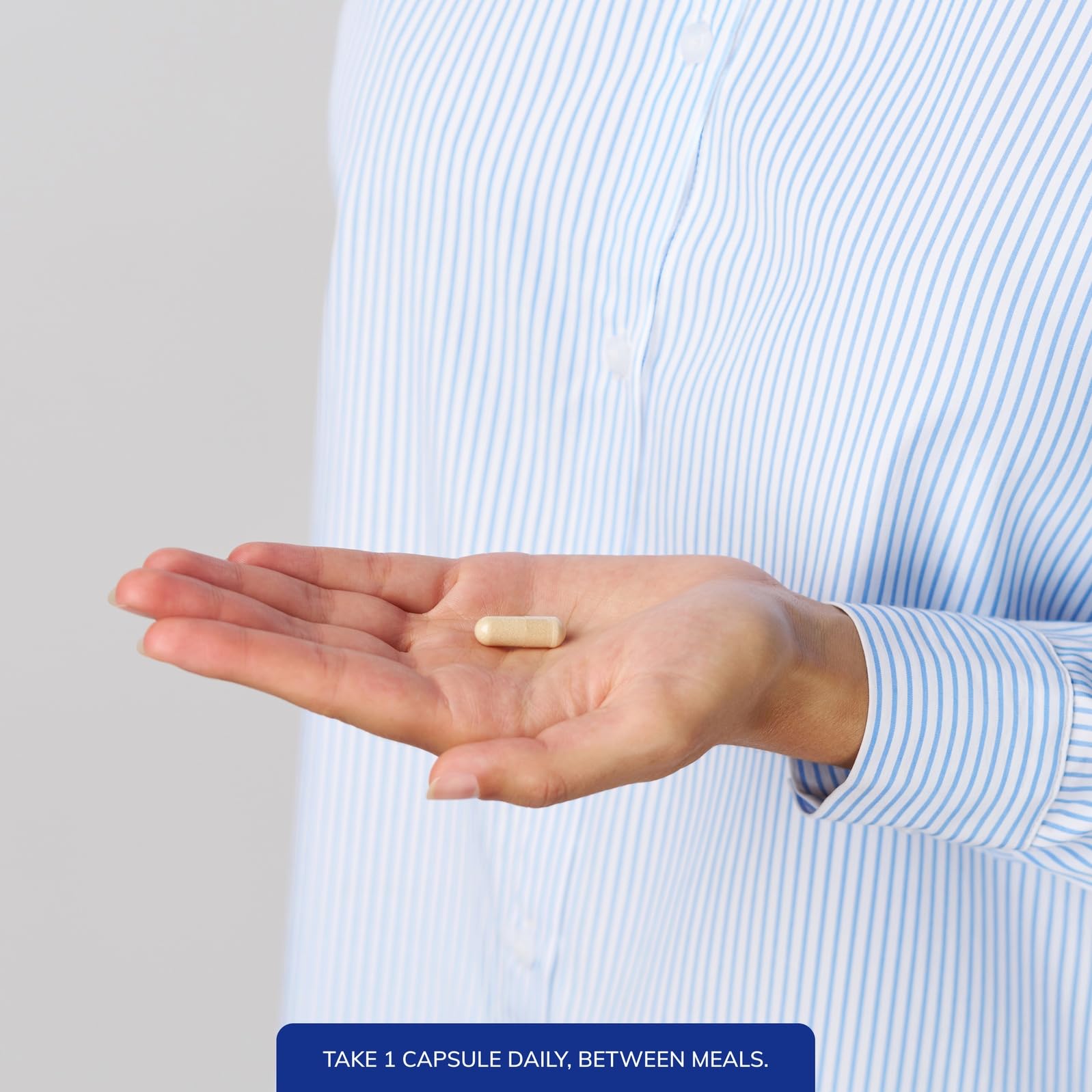 Pouring Pure Encapsulations GABA capsules for convenient daily use